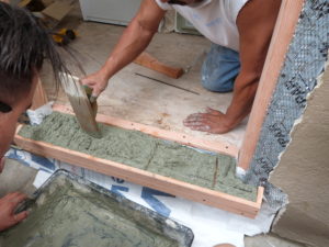 5. Additional concrete being applies. Concrete has a green dye or pigment so color is consistent all the way through.